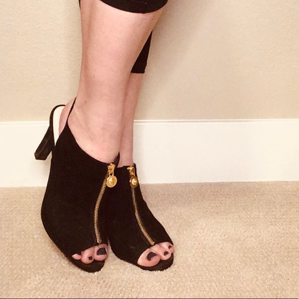 Open toe zip up pumps.